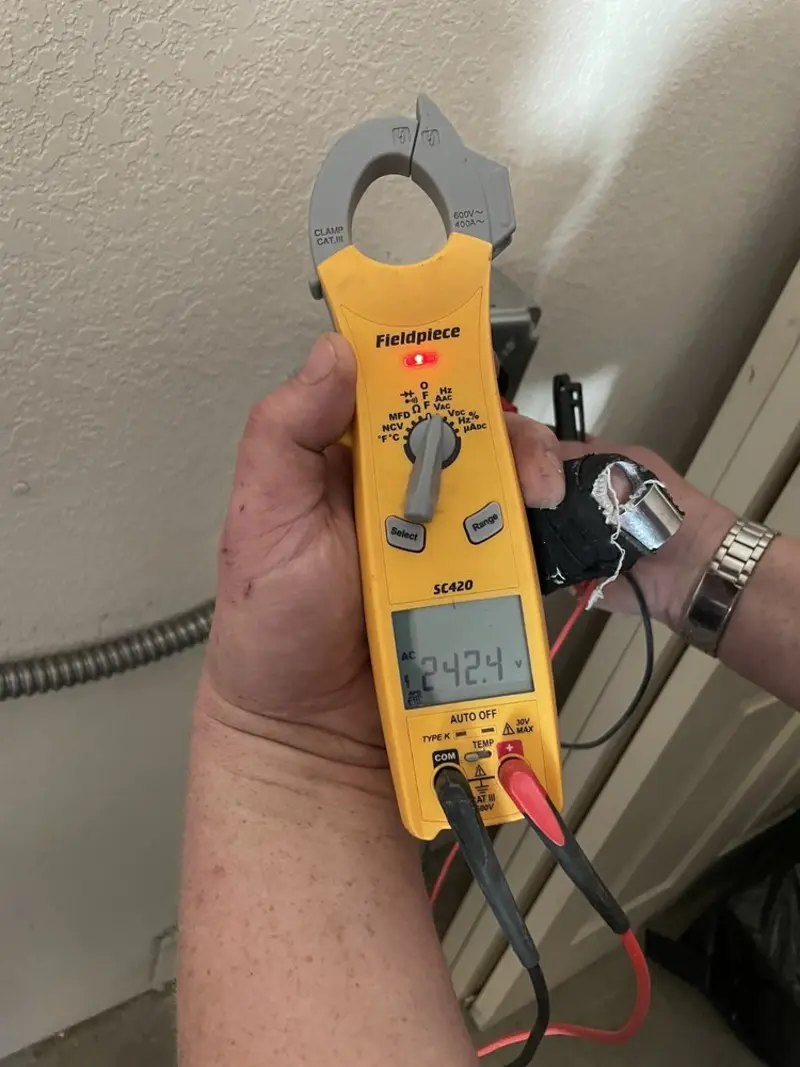 Voltage testing with clamp meter during Outlet Installation in Coalinga